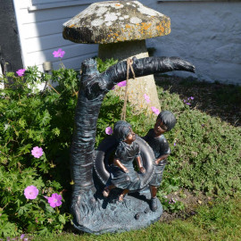 Bronze effect Children on Tyre Swing